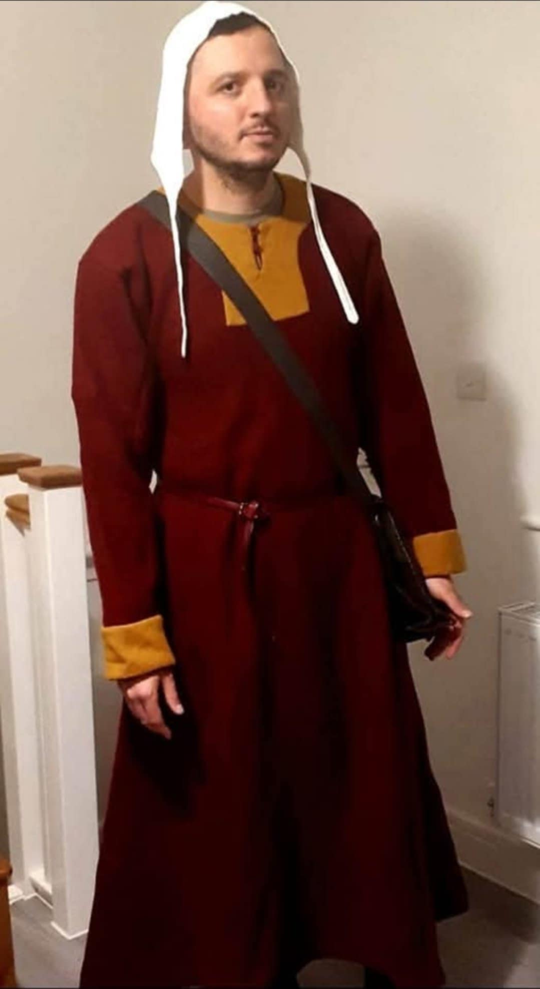 Deep Red Garment Worn by Man