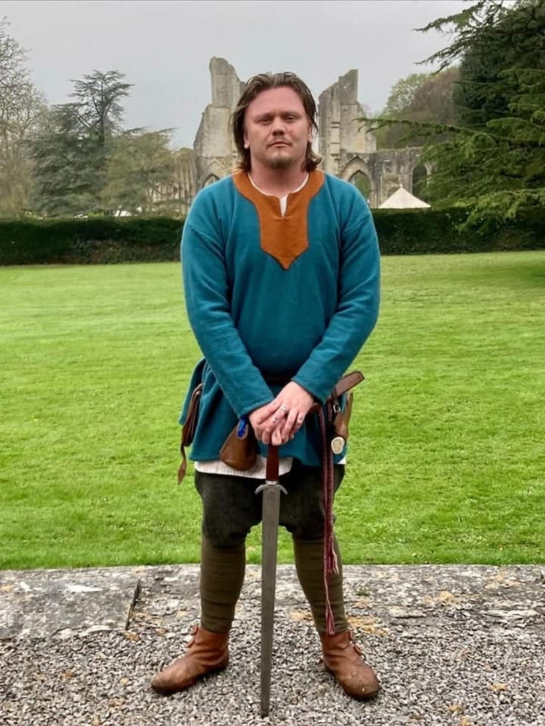 Man with Sword in Front of Castle